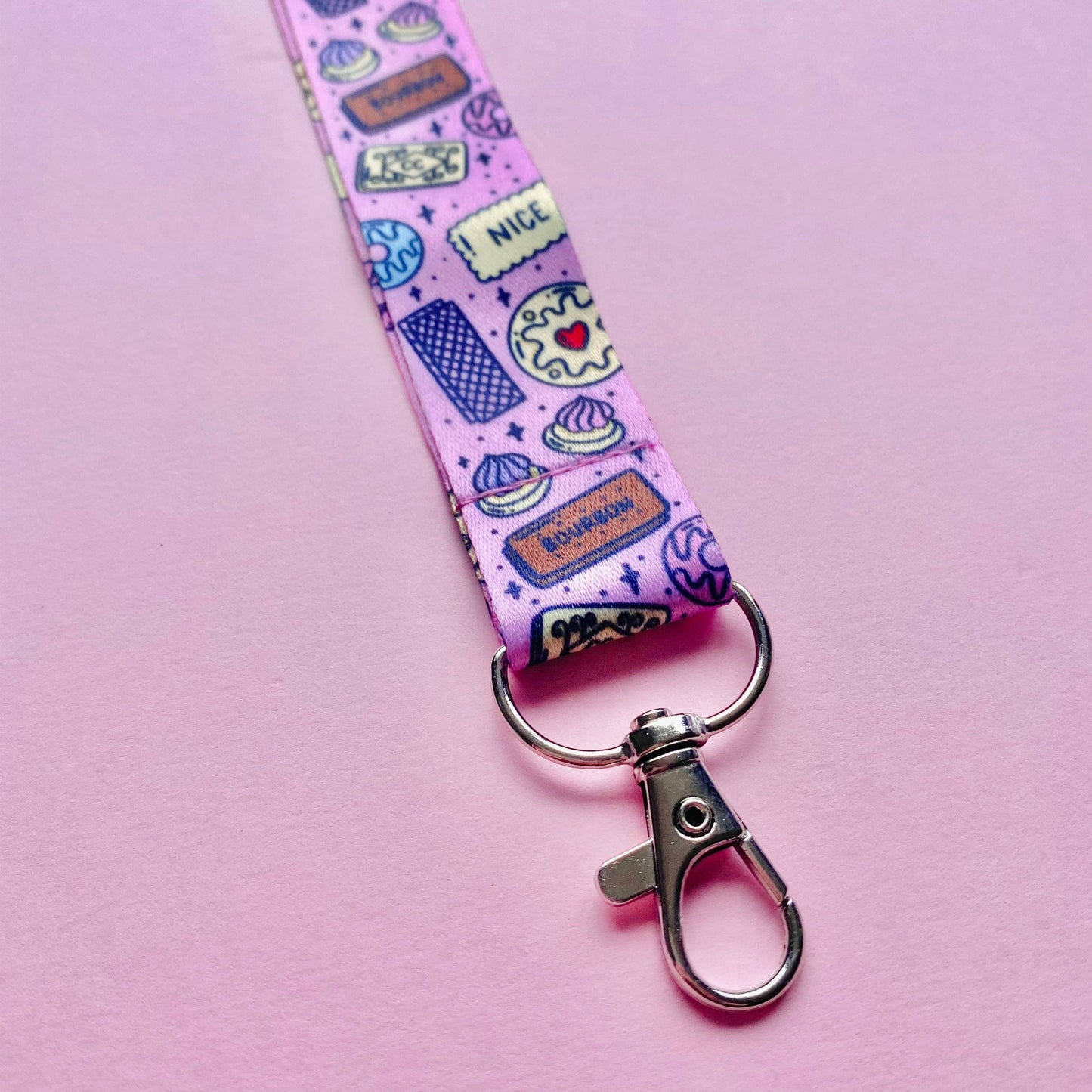Keychain with colorful pattern on a pink background