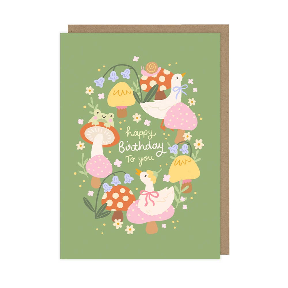 Greeting card with ducks and mushrooms on a green background