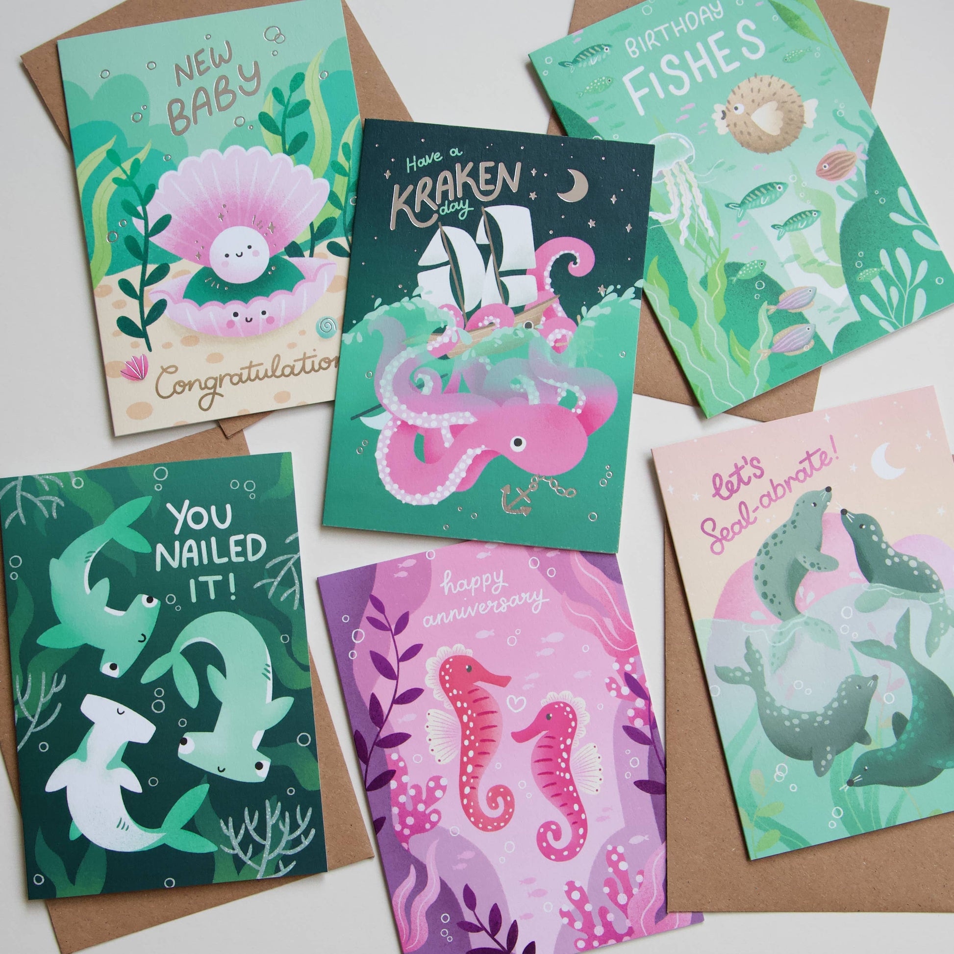 Collection of greeting cards with underwater-themed illustrations on a white background.