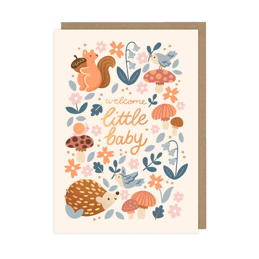 Greeting card with forest-themed illustrations and 'welcome little baby' text on a white background.
