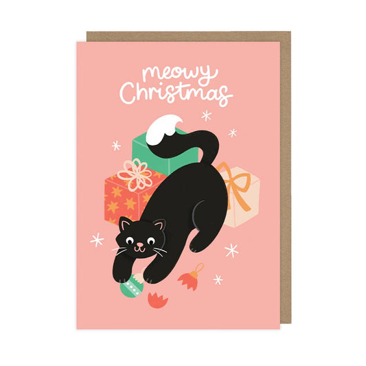 Christmas card with a black cat and presents on a pink background