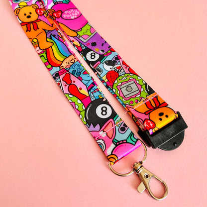 Colorful lanyard with cartoon characters on a pink background