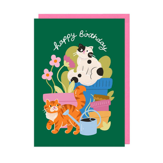 Birthday card with cats and plants on a green background