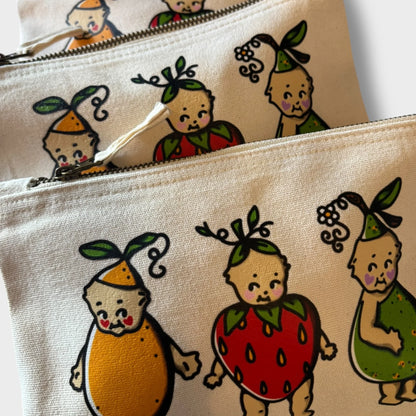 Two pouches with cartoon characters on a beige background
