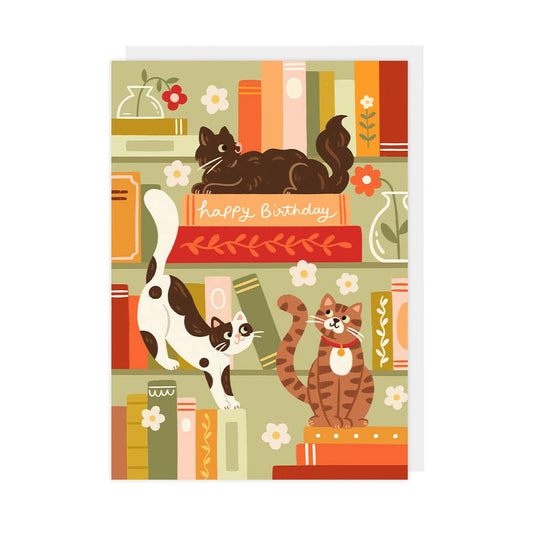 Birthday card with cats on books and 'Happy Birthday' text