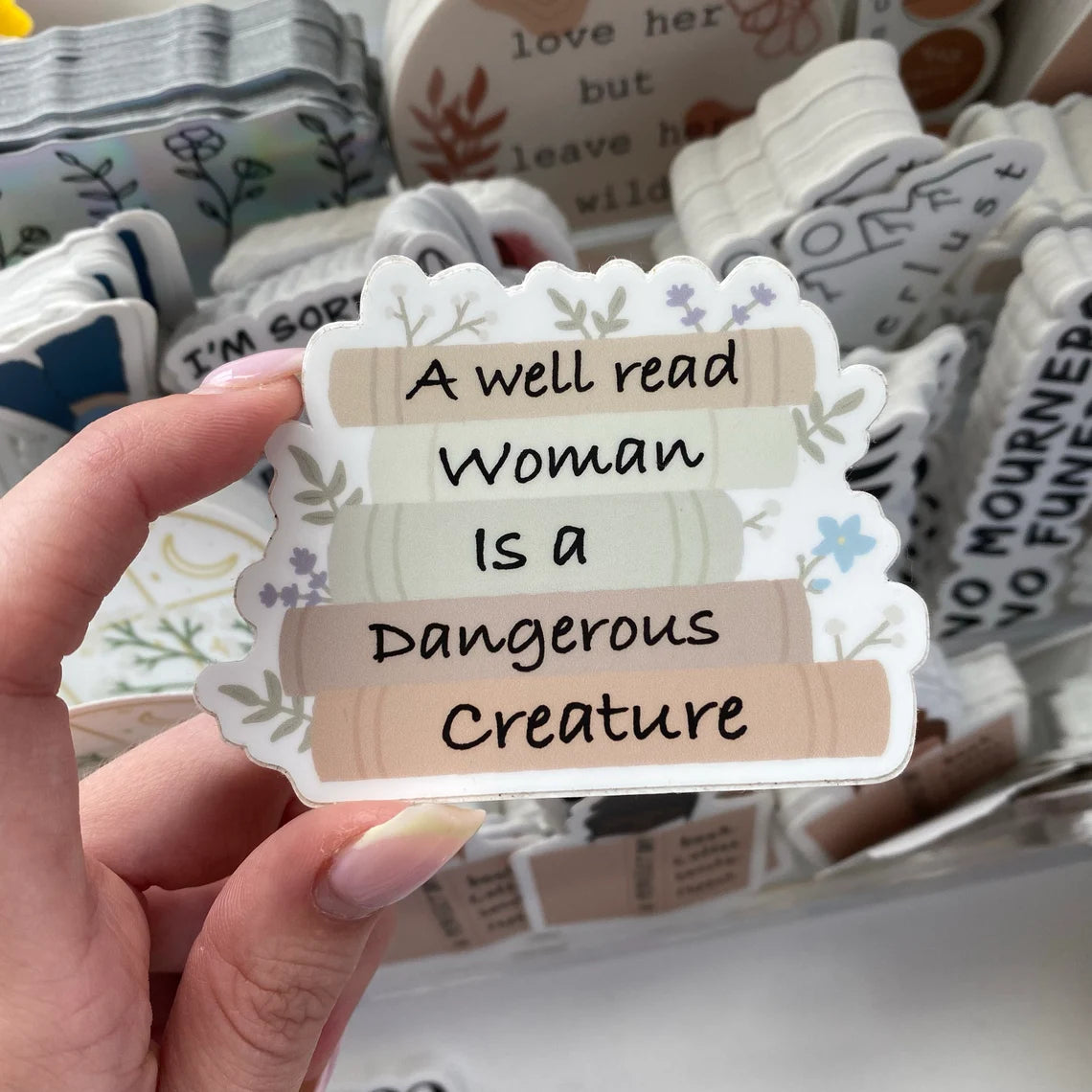 A Well Read Woman Is A Dangerous Character - Sticker